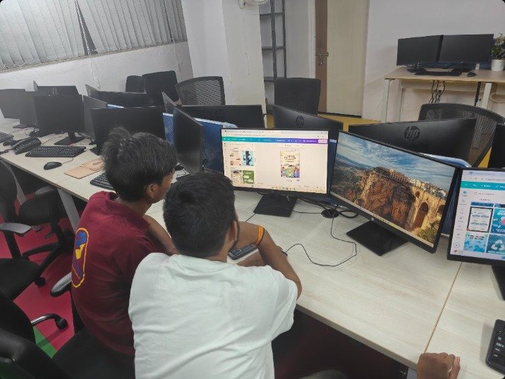 Students working together at a computer
