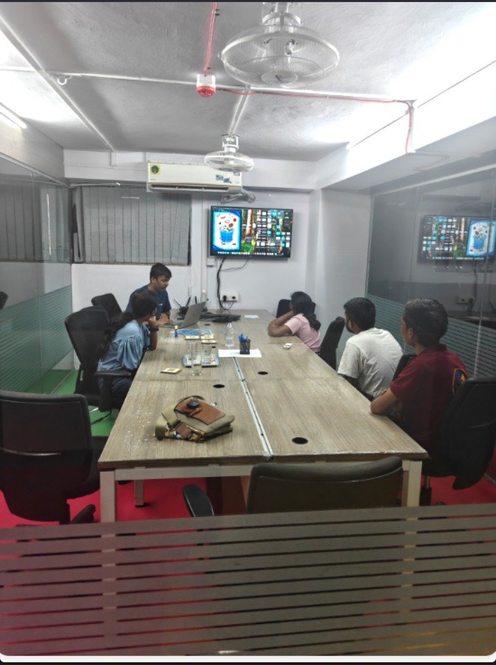 Students watching a presentation in the meeting room